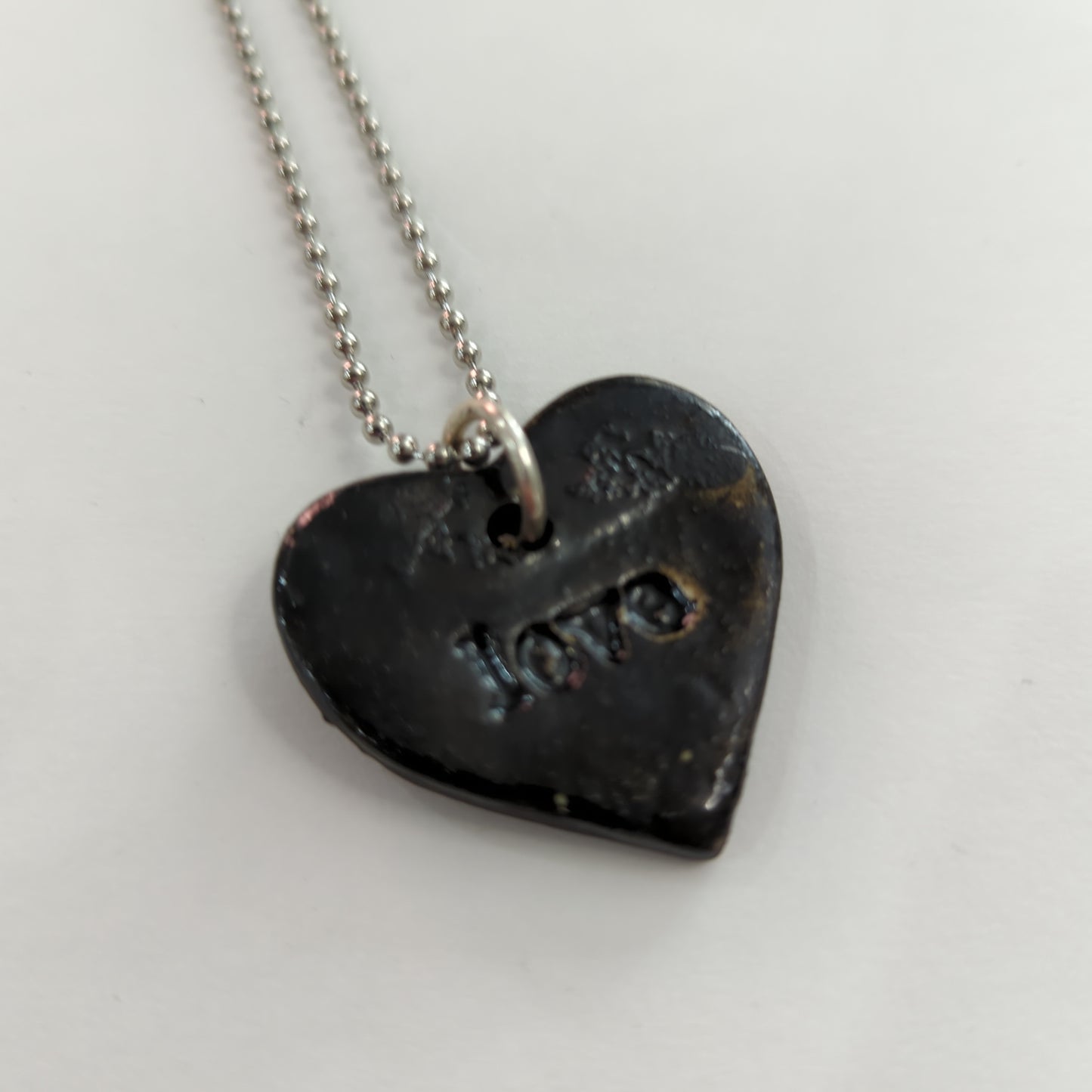 Love Inscribed Black Heart Necklace