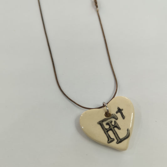 Faith Lutheran White Heart Necklace