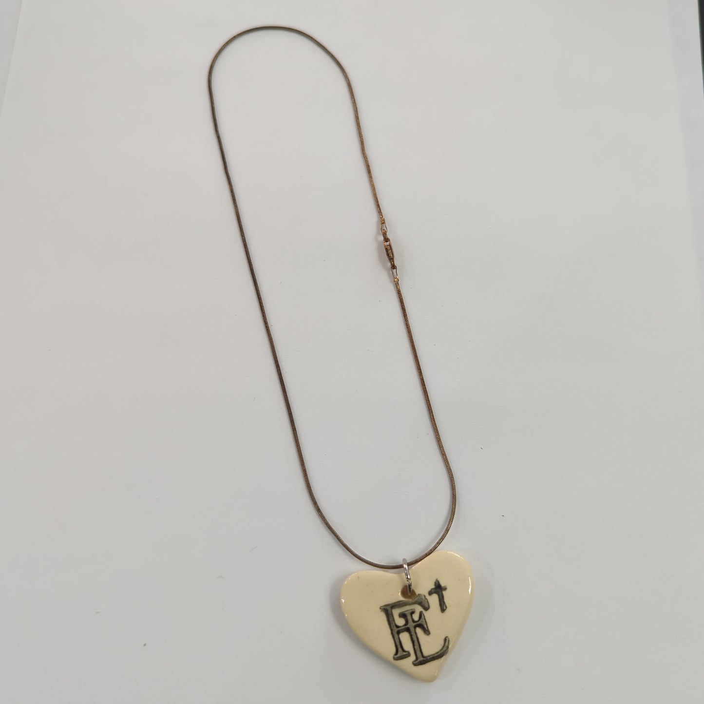 Faith Lutheran White Heart Necklace